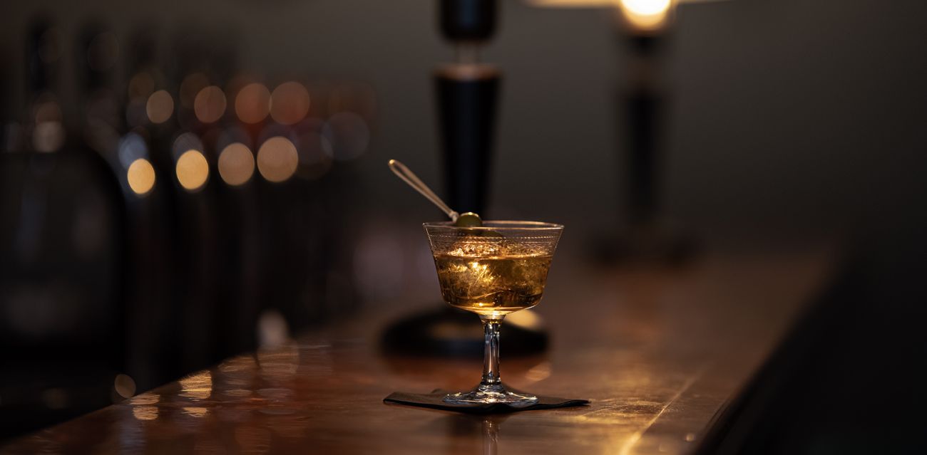 Cocktail on the counter of Three Fingers Bar HafenCity