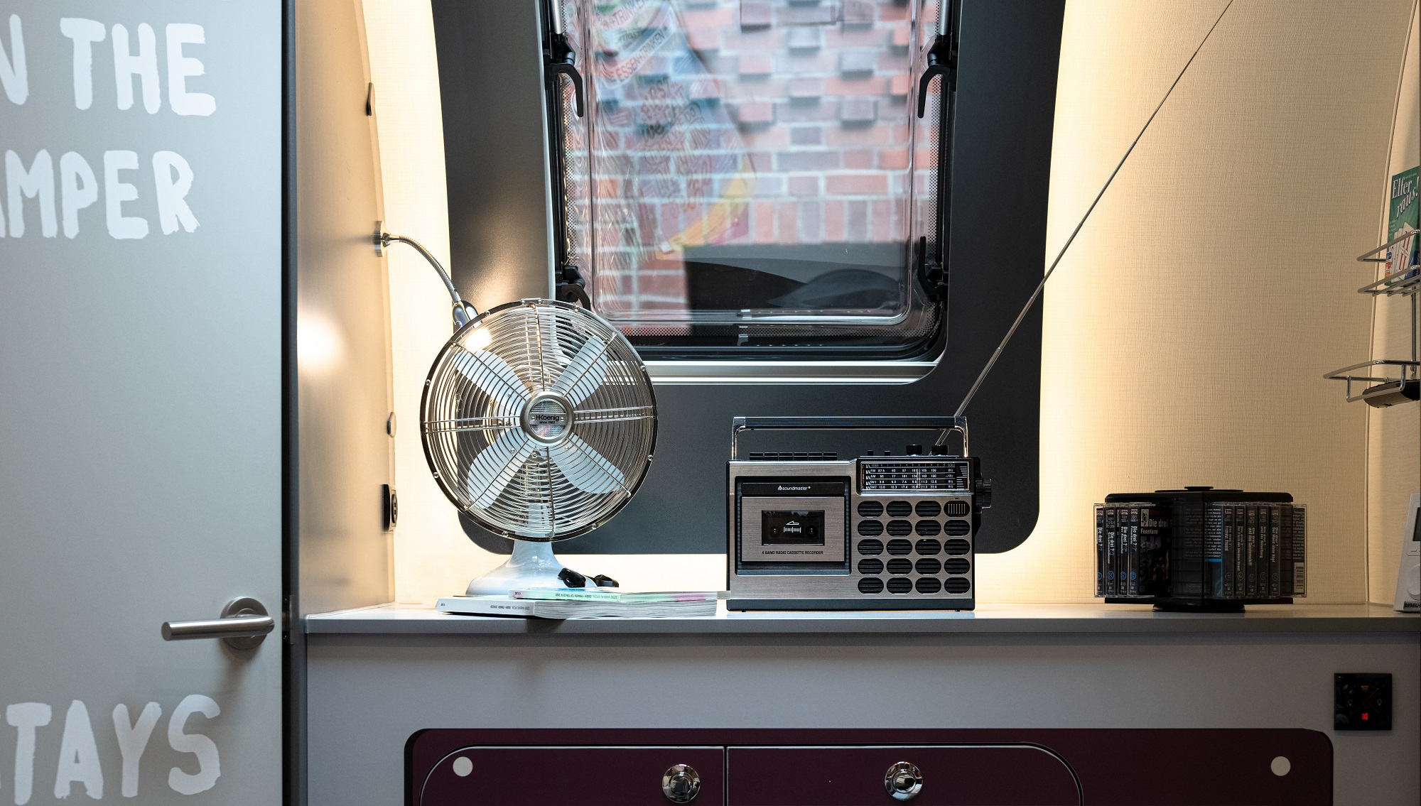 Close-up of a small niche with retro radio in the camper RETRO