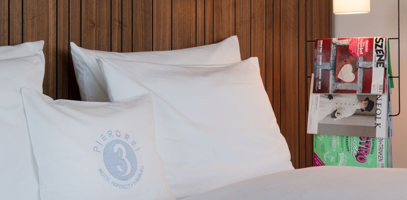 Close-up of a bed in a room of the EXTRA LARGE category