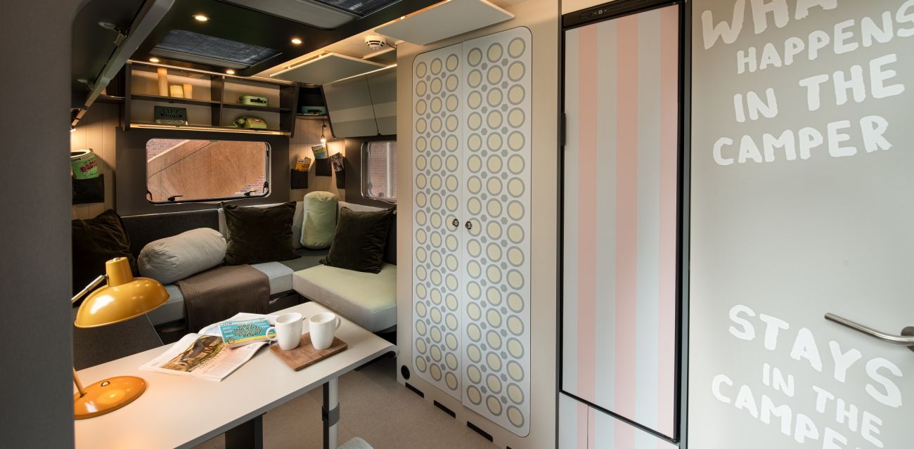 View of table and chill lounge in camper RETRO